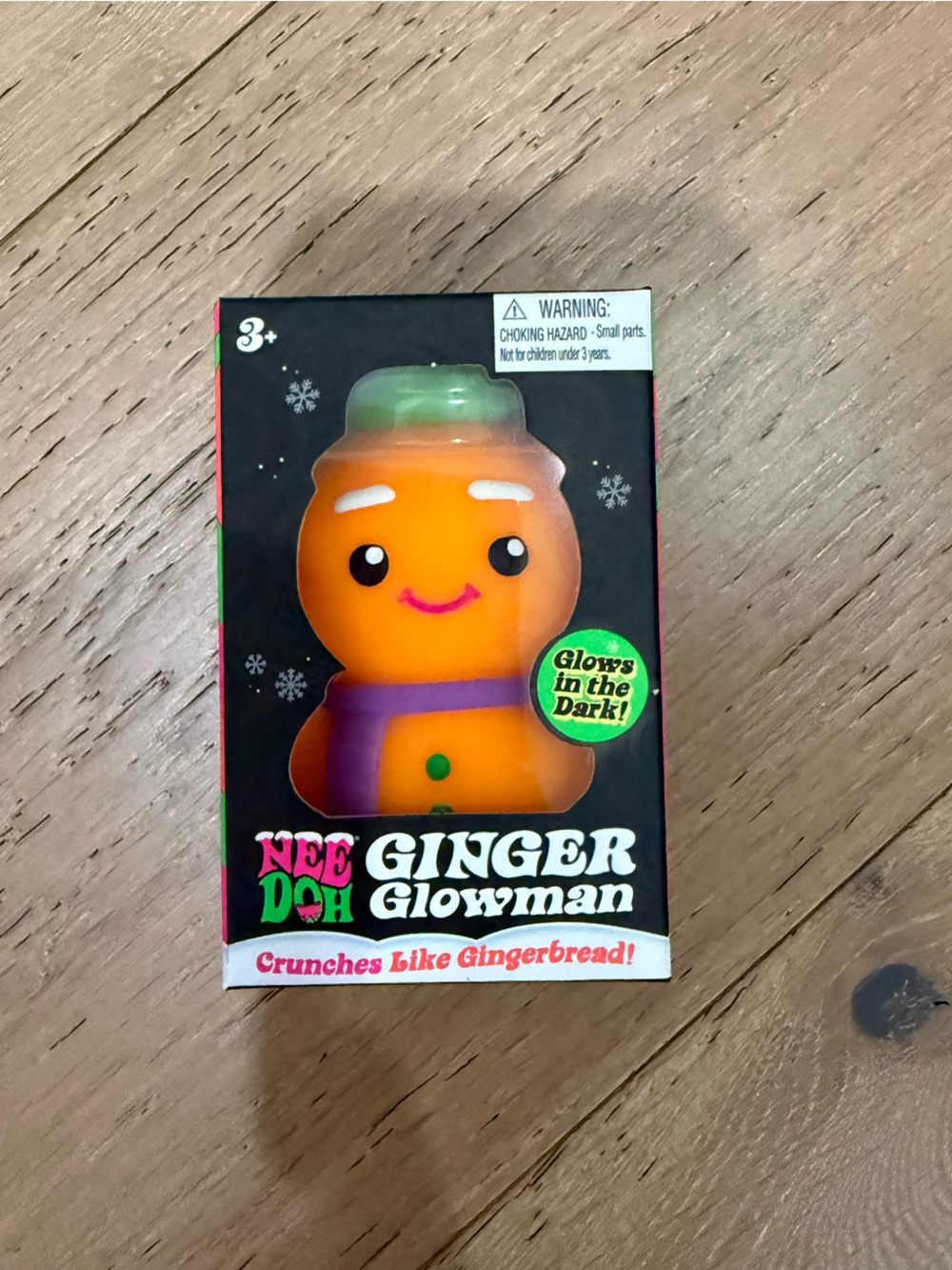 NeeDoh Ginger Glowman- orange with a purple scarf